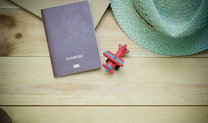 passport with a toy plane