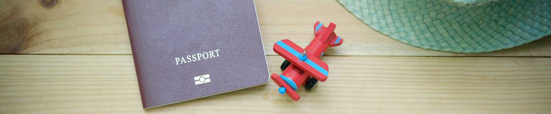 passport with a toy plane